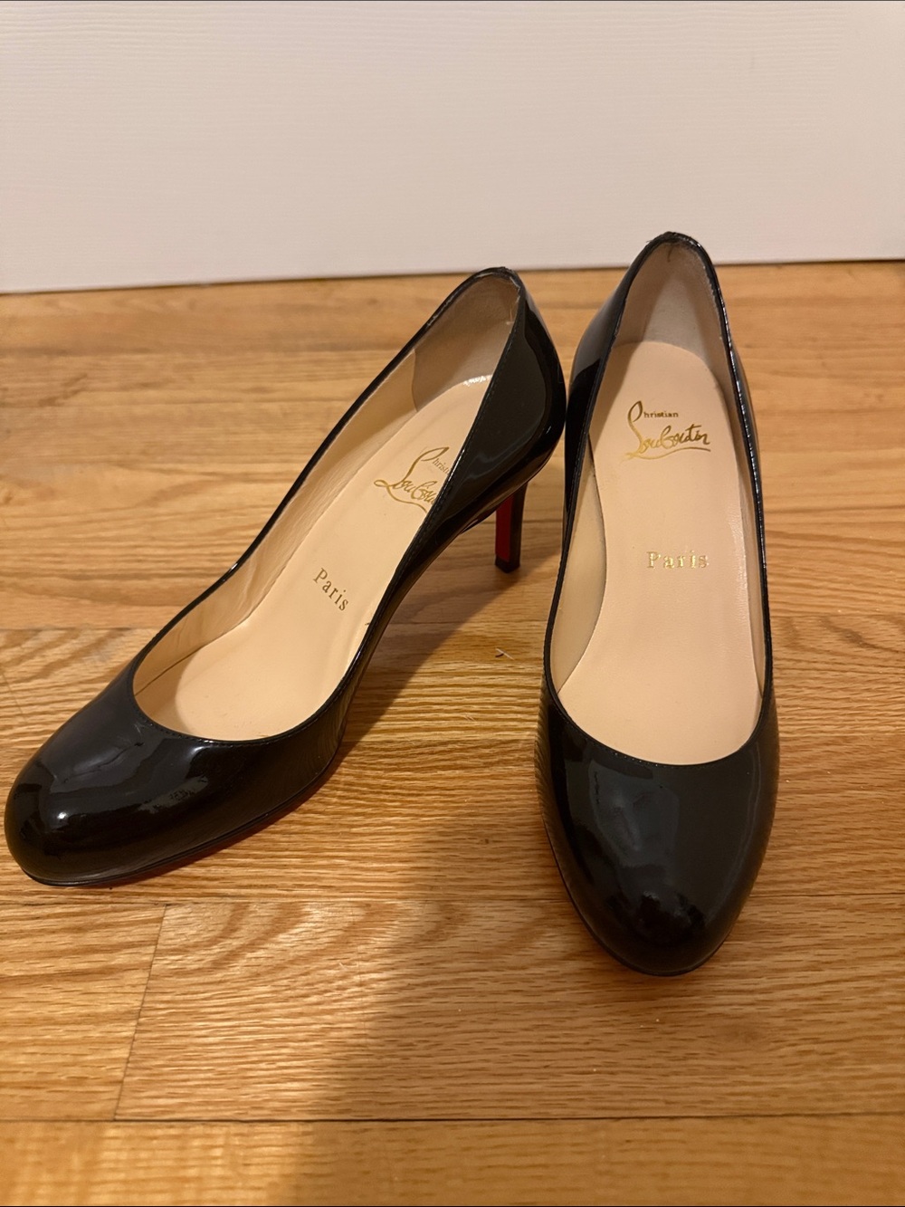 Christian Louboutin Glossy Black Patent Round-Toe Pumps with Red Sole